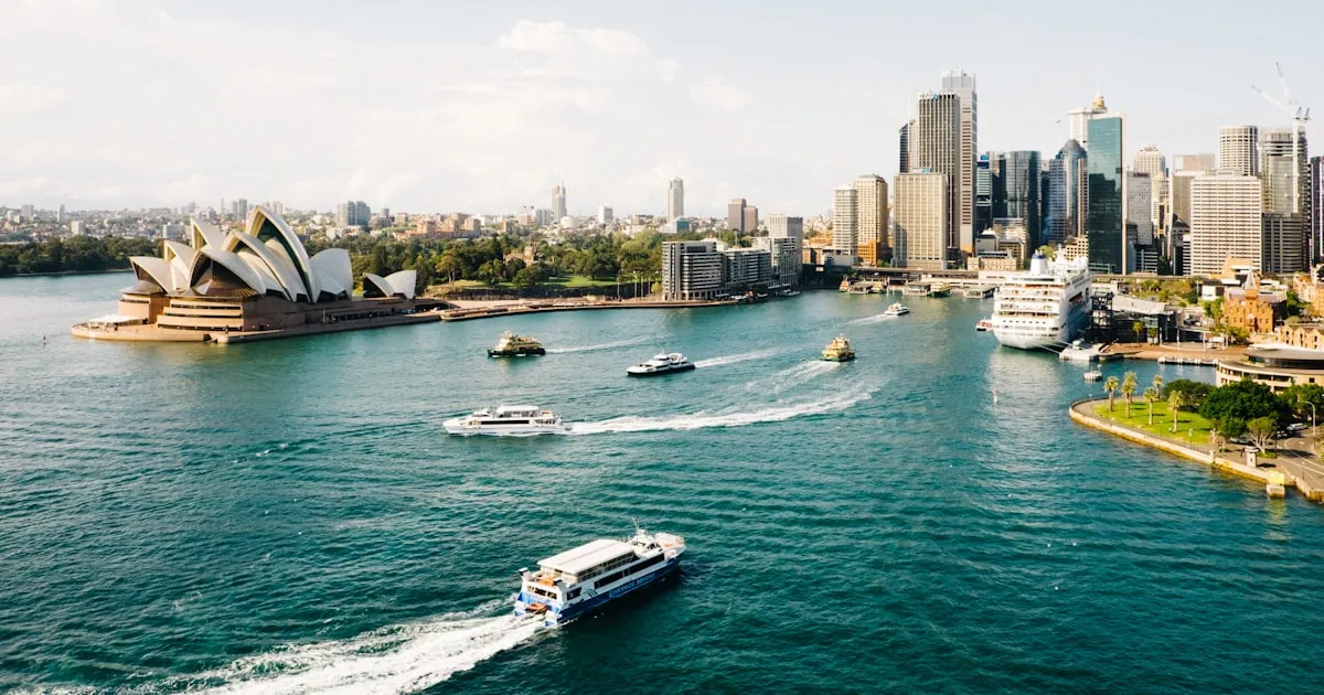 Sydney Opera House and ferries on the harbour at Circular Quay